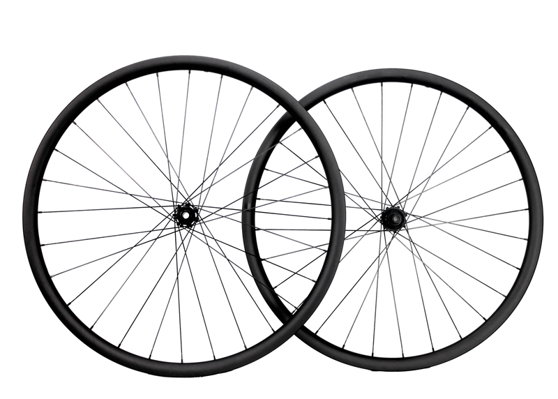 MOQUAI Laufradsatz Gravel Disc Carbon 28mm mit SAPIM CX-RAY SecureLoc